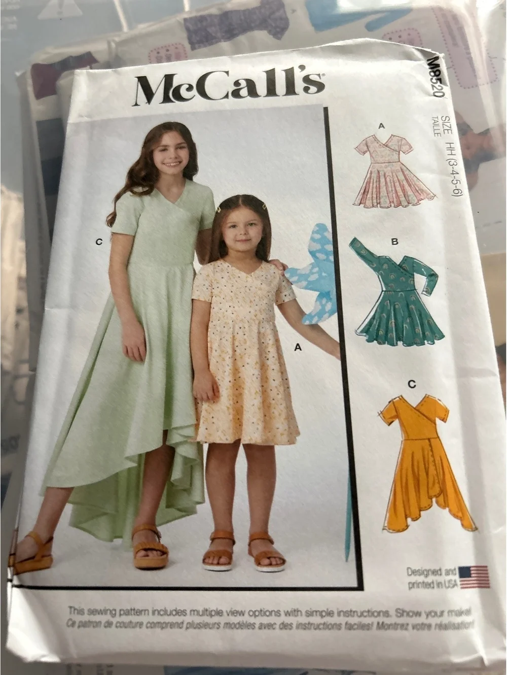 McCall's M8520 Girls' Dress Sewing Pattern - Multiple Styles and Sizes
